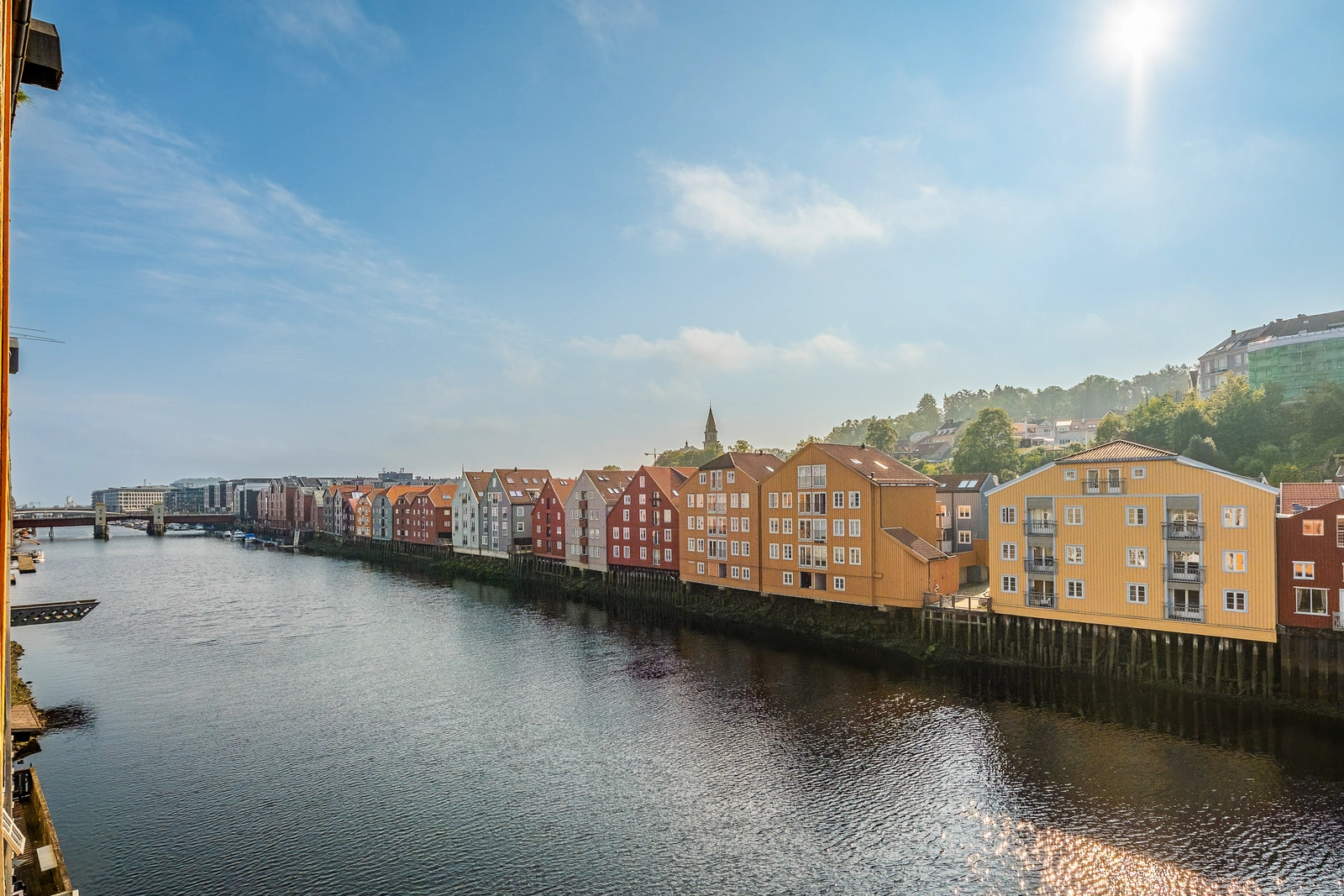 The wharf buildings on Kjøpmannsgata along the Nidelva river in Trondheim, where the office is located
