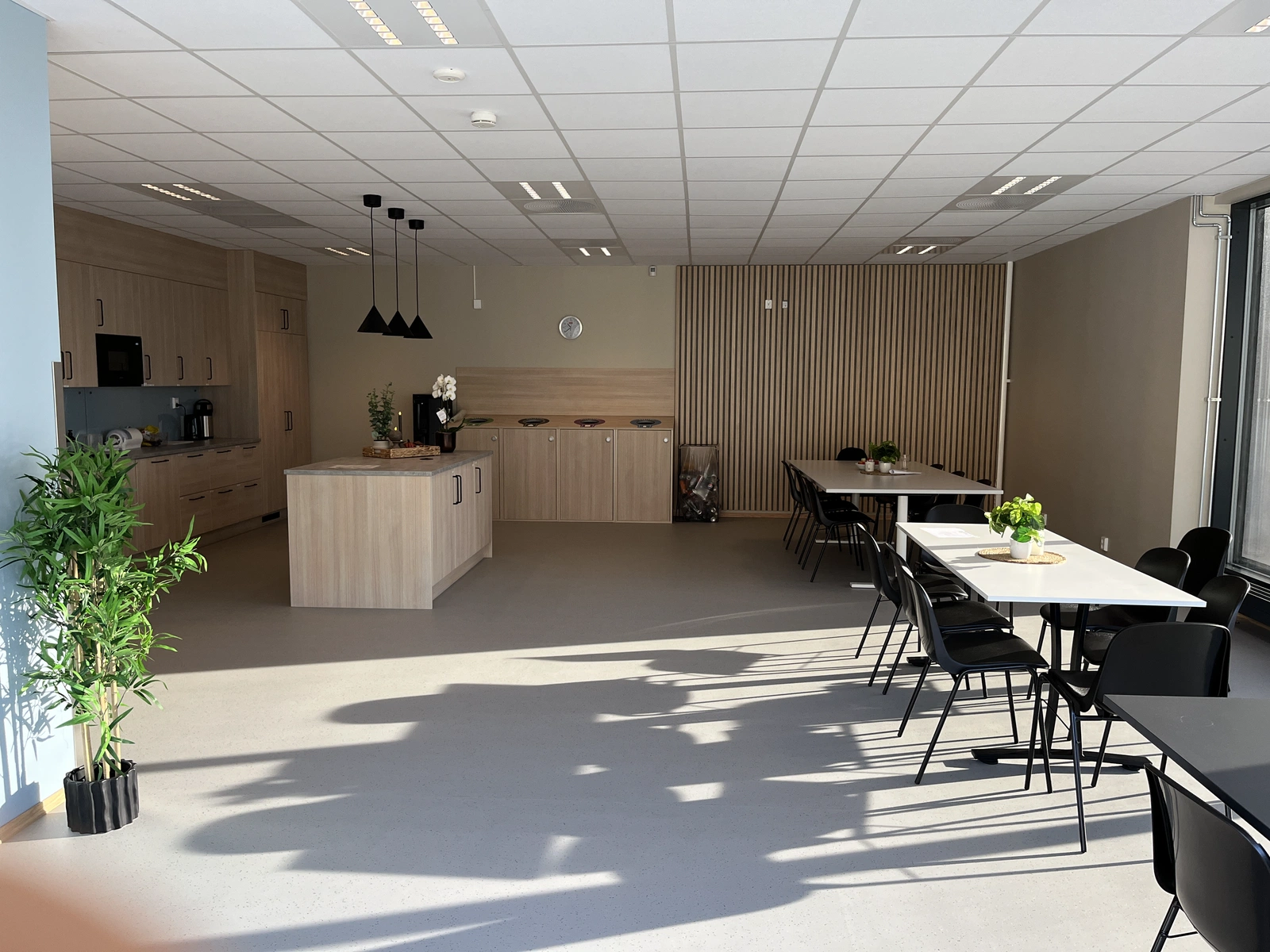 The break room at Storvik in Mosjøen, lit by large windows